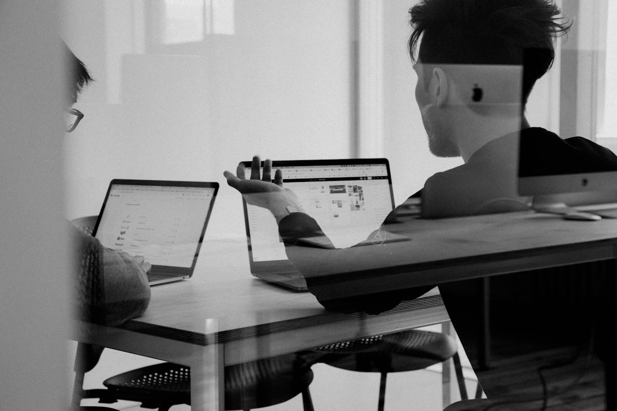 Support professionals working together in a modern office